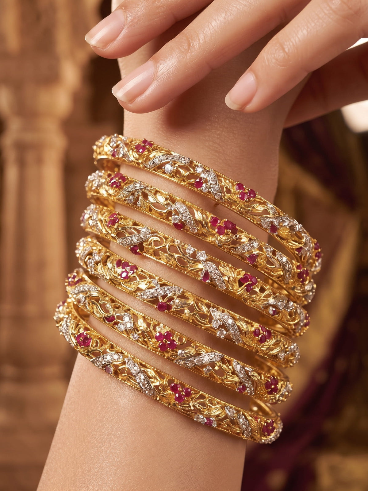 Ruby and American Diamond gold filigree bangles stacked on wrist - bridal kangan set Pakistan