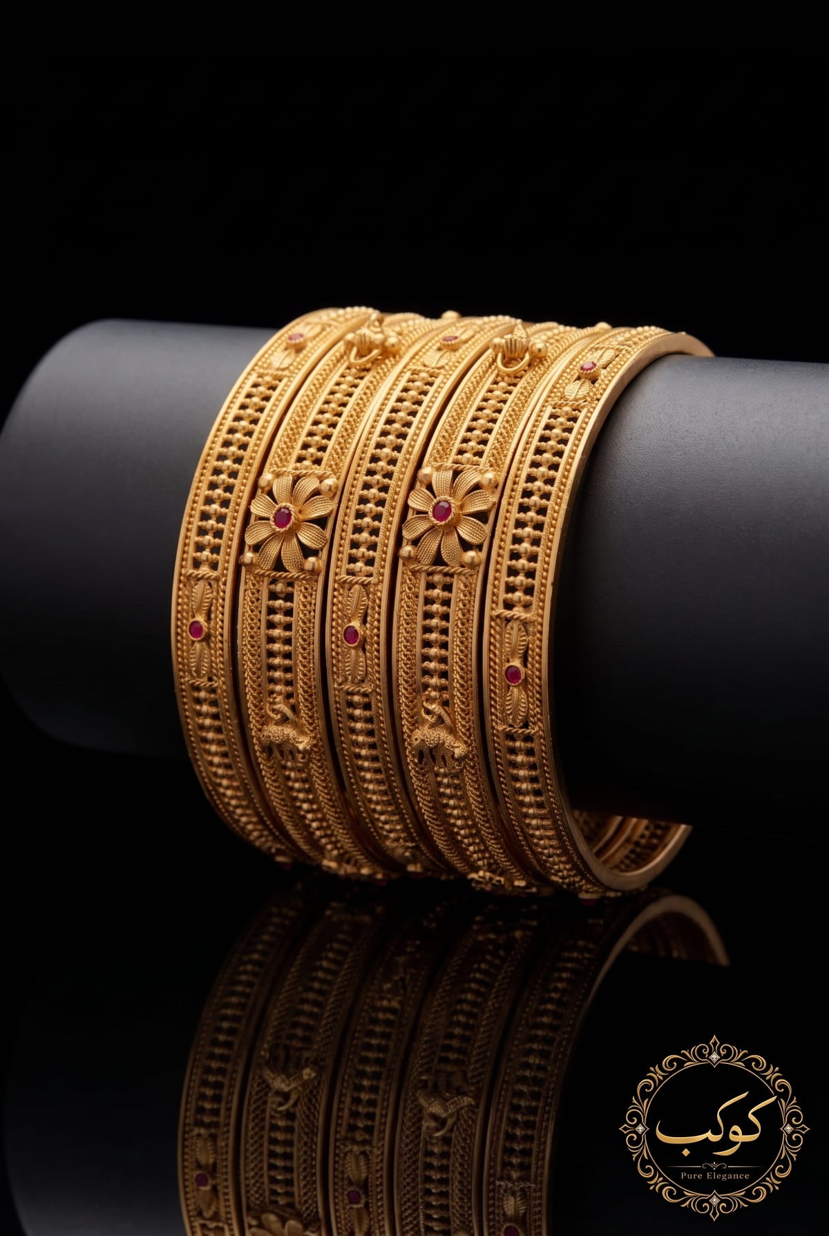 Gold plated Rajwadi churi kangan set of 6 on display - ruby stone bangles Pakistan