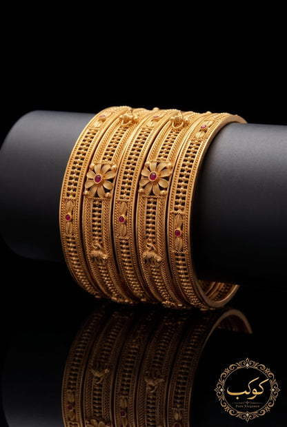 Gold plated Rajwadi churi kangan set of 6 on display - ruby stone bangles Pakistan