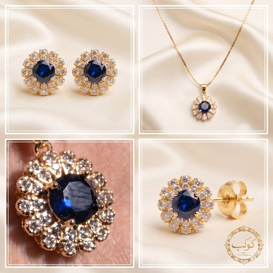 Royal blue floral halo pendant necklace and matching stud earrings set in gold plating by Kokab Jewellers