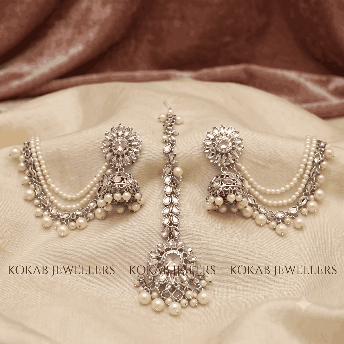 Silver Copper Uncut Kundan Bahubali Sahara Earrings and Maang Tikka Set with Pearl Chains by KOKAB JEWELLERS