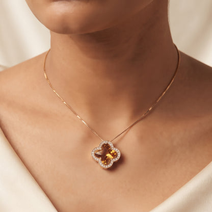 Close-up of Amber Gold Clover Pendant Necklace with Diamond Accents - Kokab Jewellers