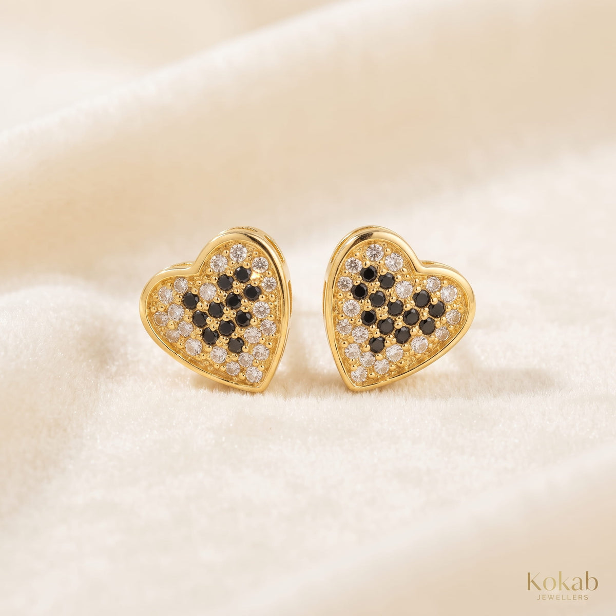 Two-tone gold plated heart jewellery set featuring black crystals