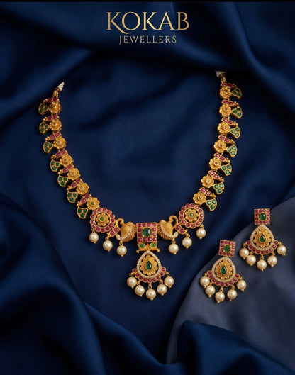 Gold plated ruby emerald necklace with peacock accents - wedding jewellery online Pakistan