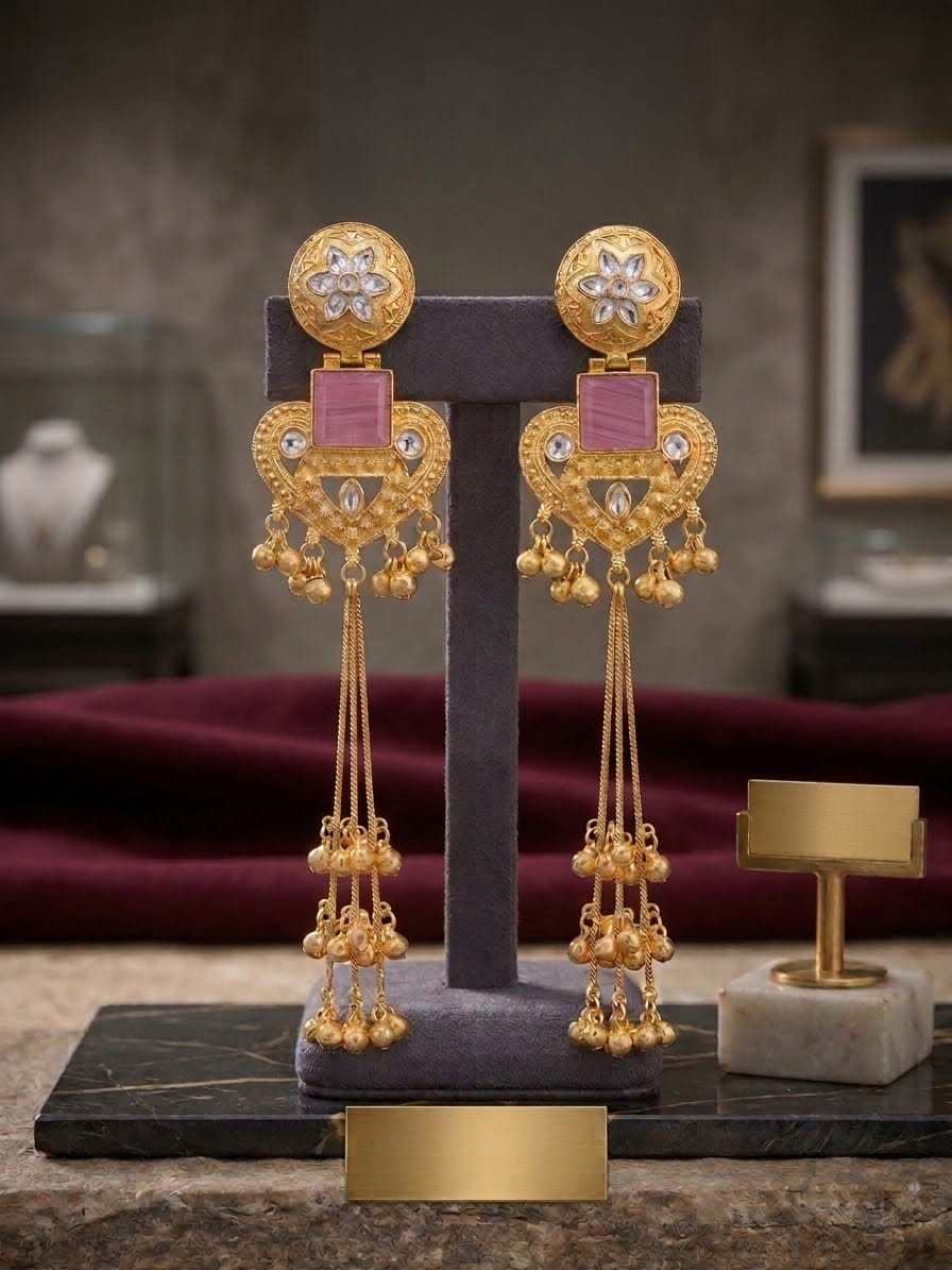 Pink Kashmiri long jhumka earrings with kundan, cascading chains, and tiny hanging ghungroo tassels.